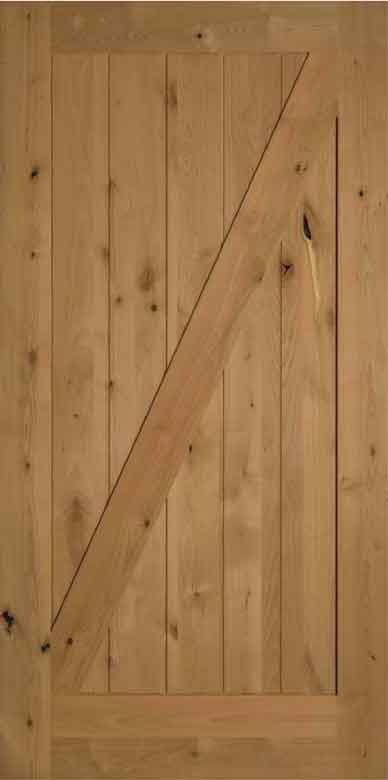 A wooden door with vertical planks and a diagonal Z-brace design.