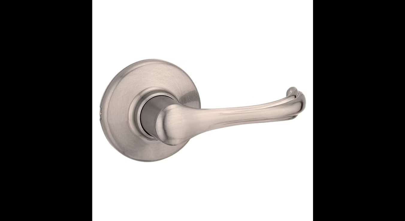 Brushed nickel door handle with a curved lever mounted on a round backplate, viewed from the side.