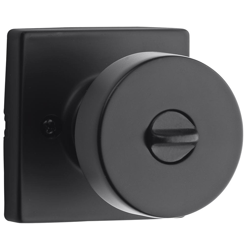 Black door knob with a square backplate and a twist lock mechanism.