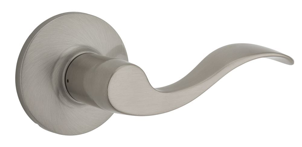 A silver door handle with a curved lever design is mounted on a round baseplate.