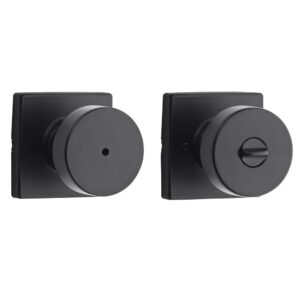 Black door knobs with square plates; one with a privacy pinhole, the other with a thumb turn lock feature.