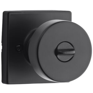 Black door knob with a square backplate and a twist lock mechanism.