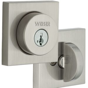 Close-up of a square, satin nickel deadbolt lock set with a keyhole and a thumb turn.