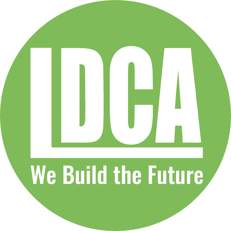 Green square logo with large white text "IDCA" and smaller text "We Build the Future" underneath.