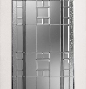A rectangular, decorative glass window panel with a geometric pattern set in a white frame.